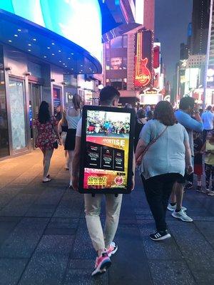 Times Square walking billboards.