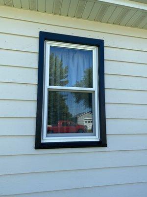 New window with black capping around trim