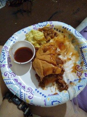 What's left of my chopped beef sandwich and sides.  Pecan brownie and caramel cake next.