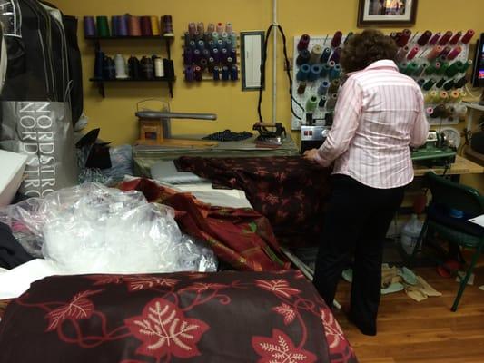 Ioana pressing my newly created tablecloth