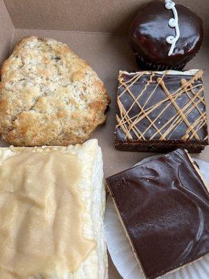 Bakery treats. Peach pop tart, choc pb scone, choc cupcake, pb brownie, twix bar. All delicious!