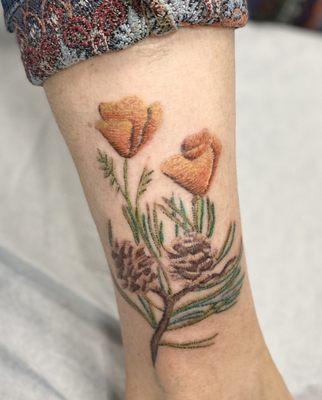 Embroidery style tattoo by Karen at Sacred Rose Tattoo