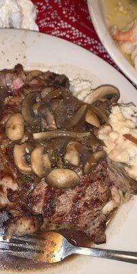 Steak with au jus and mashed potatoes