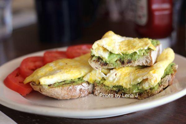 Avocado Toast ($14) - it's OK, needs more salt. Toast, avocado spread (lemon, sunflower seeds, red pepper flakes, garlic), egg.