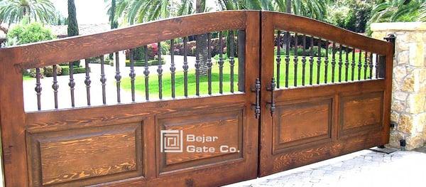 San Diego Iron Gates and Driveway Gates.
 
 This is an ornamental and wrought iron wood gate in San Diego.