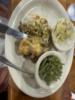 Smothered grilled chicken with cabbage and green beans.  Delicious!