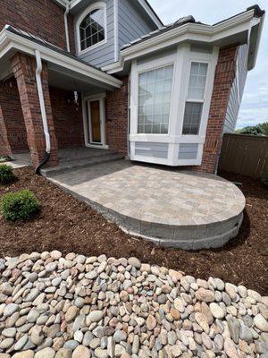 Front yard interlocking paver patio, plantings, mulch, & cobble bedding