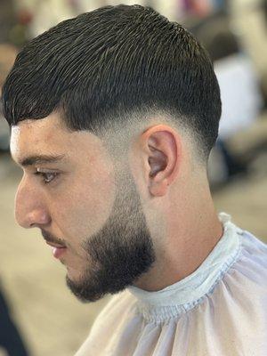 Low fade with beard line up