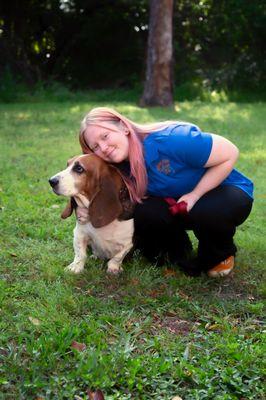 Hailey with Duke the company mascot.