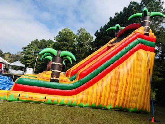 Part of the Kid's inflatable play area. $12 all day wristband or $7 stay as long as you like but cannot leave area & come back.