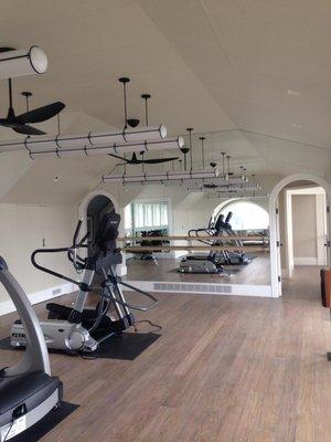 Mirrors with ballet bars, angles and shapes on gym wall