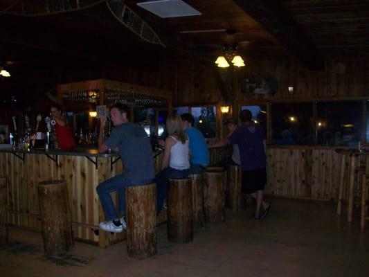 Enjoy your favorite beverage in the lounge at the historic Timbers Restaurant