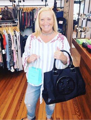 Our customer is loving her new Tiffany's necklace and Tory Burch bag!