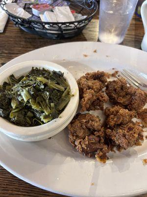 Chicken livers and greens, (mash potato with white gravy did  not make it in the picture)