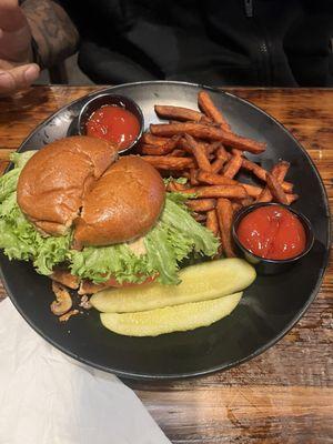 Bacon cheeseburger with sweet potato fries.