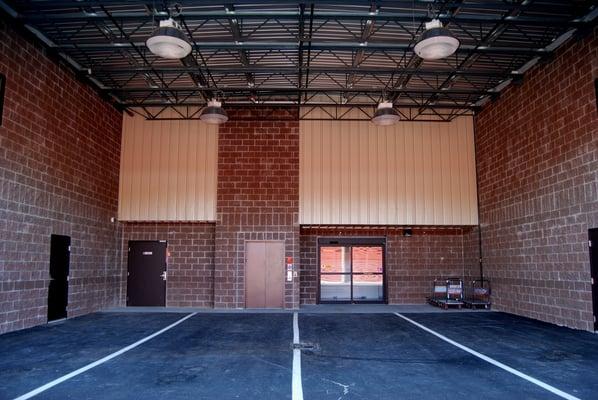 Covered loading bays with flat bed push carts to make moving easier and keep your items dry!