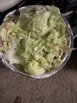 This is what a 12 dollar chicken Caesar salad looks like! What a joke.