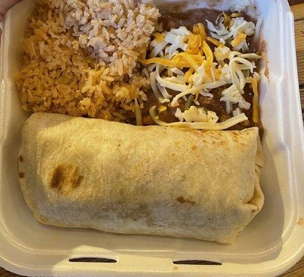 Shredded chicken burrito with rice and beans