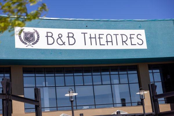 Image of the exterior of the building featuring a large B&B Theatres sign