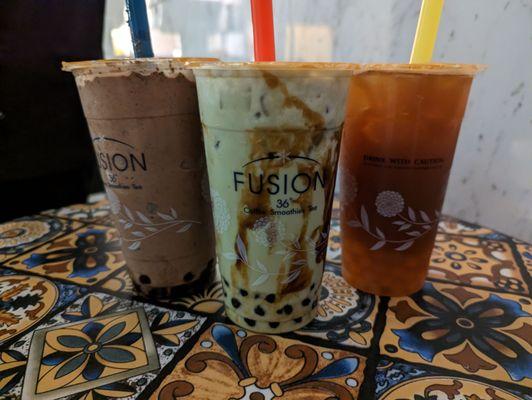 Matcha sugar milk with boba and mango tea with boba