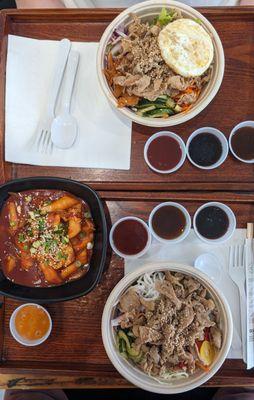 Spicy rice cakes, purple rice chicken bowl, noodle chicken bowl with egg