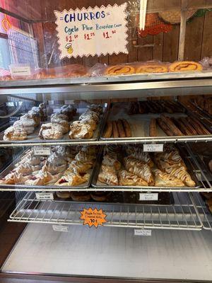 Homemade apple fritters and cinnamon rolls.