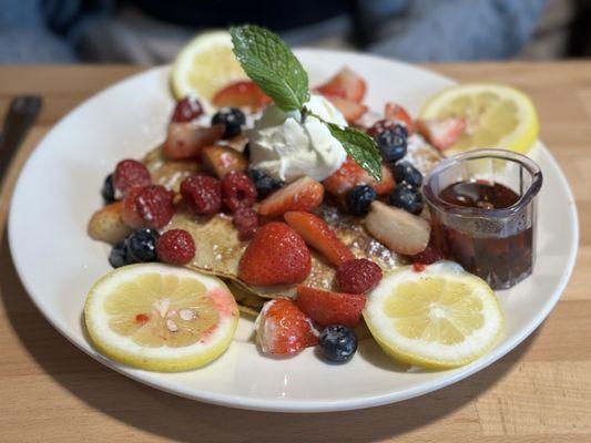 Lemon ricotta pancakes Pancakes, berries, sauce, cream