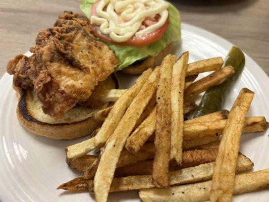 Pork chop sandwich with fries