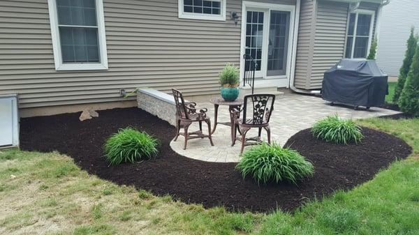 Recently replaced old sunken patio with this stunning new one. Sitting wall added.
 05/2016