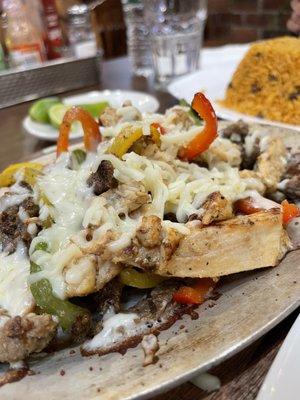 Beef and Chicken Fajitas with melted cheese