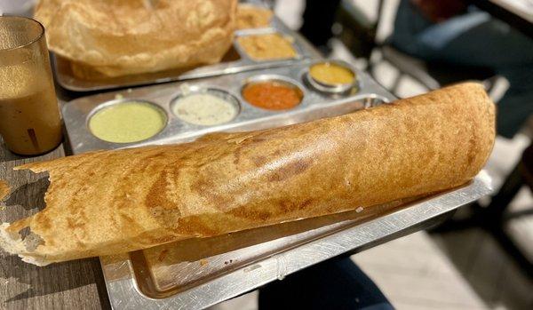 Masala Dosa - a thin rice and lentil crepe filled with spiced mashed potatoes and onions, served with chutney and sambar