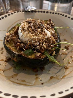 Burratta cheese in roasted acorn squash.