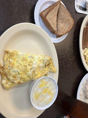 Veggie Omelet with wheat toast and grits