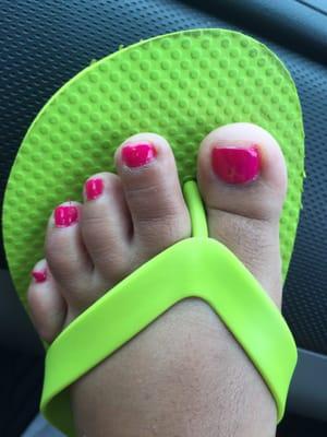 Toes nails cut too short with paint slapped on.