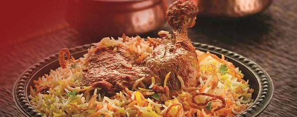 Layered basmati rice and spiced chicken slow-cooked to perfection, served with raita or gravy.