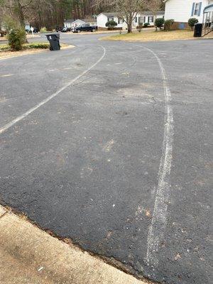 Tire marks from car getting dragged