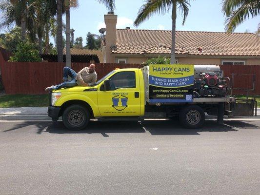 Your trashcans will smell as suave as the owner posing on his truck.