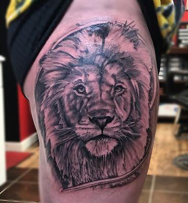 Black and Grey Lion Tattoo on Thigh