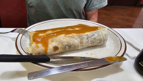 Chile relleno burrito with added rice and beans (inside) and medium sauce