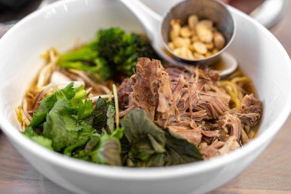 Saimin -($22)
 locally-made iwamoto family noodles all natural pork, broccoli, bean sprouts, red onion,
 peanuts, cilantro, mint