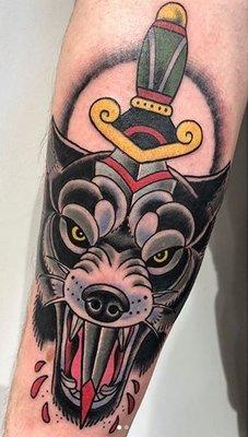 Wolf & dagger by Megan Chuntz.