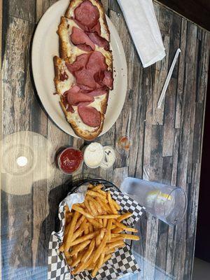 The 2 topping flatbread is a lunch special for $11.99. The fries are $2 off for lunch so $6.99.