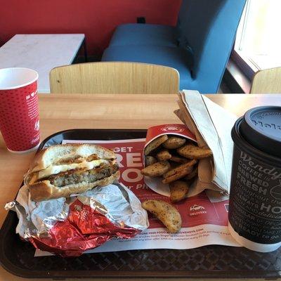 Good coffee, a breakfast sandwich, and potatoes