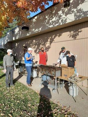 Cooking breakfast at Saint Martin de Porres. Fund raiser for IMAGINE!