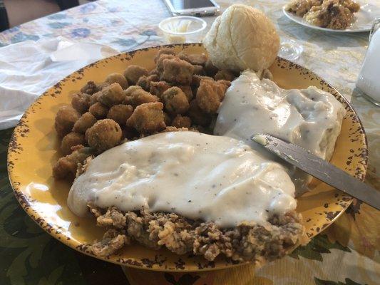 Chicken fried steak, mash potatoes and fried okra.