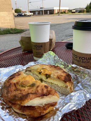 Egg and cheese on a cheddar/jalapeño bagel.