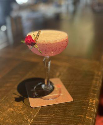 Lavender Love Spell of love with Empress Gin, lemon, lavender syrup, Opera Prima, and an edible rose to contemplate.