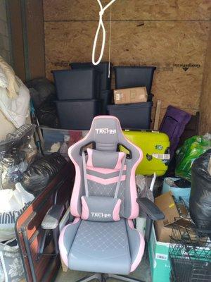 My epic gaming chair clearly the King of this storage space!