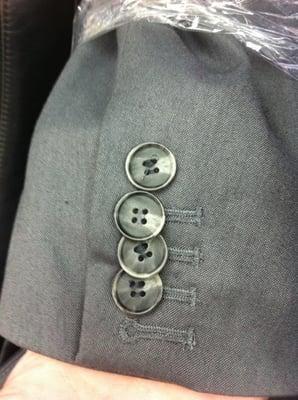 My coat with horribly sewn buttons that aren't even in a straight line.