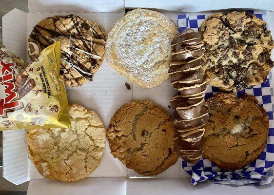 1/2 dozen cookies, Twix popcorn, and a chocolate-covered peanut-butter pretzel thing